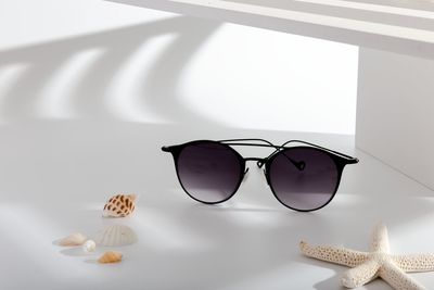 Close-up of sunglasses on table