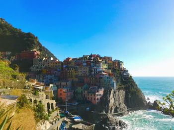 Panoramic view of sea against blue sky