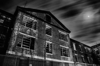 Low angle view of old building against sky