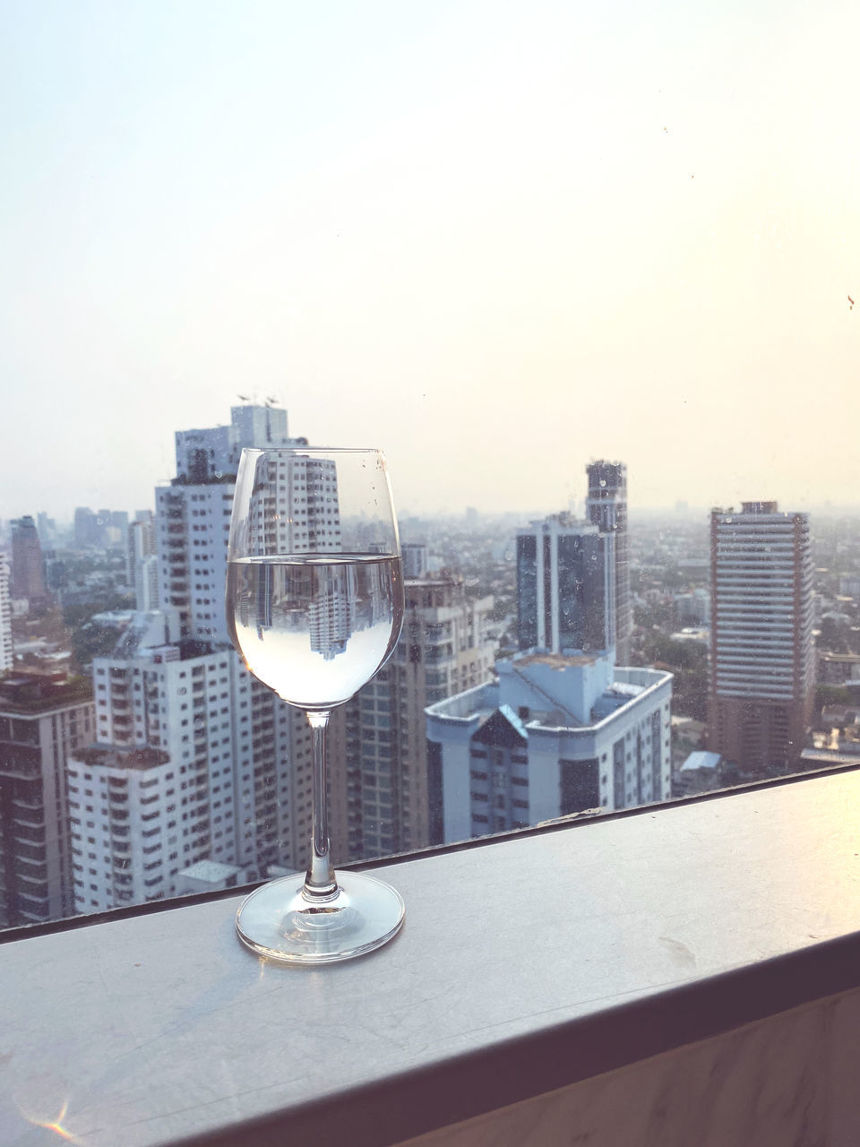 BUILDINGS IN CITY AGAINST SKY