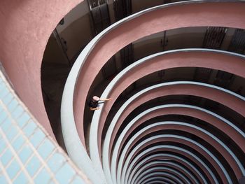 High angle view of man standing in spiral building
