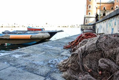 Boats moored at harbor