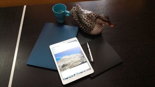 High angle view of open book on table