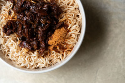 High angle view of noodles in bowl on table