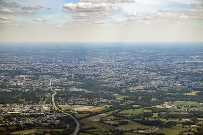 Aerial view of city against sky