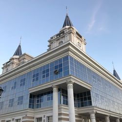 Low angle view of building against blue sky