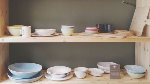 Bowls and plates in shelves