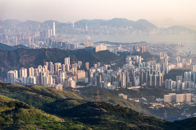 High angle view of buildings in city against sky