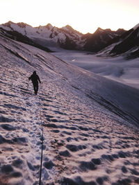 Rear view of person on land against sky