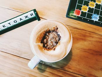 High angle view of coffee cup on table