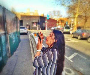 Woman walking on city street