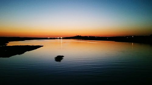 Scenic view of sea at sunset