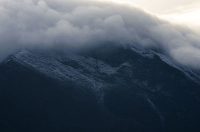 Clouds over mountain range