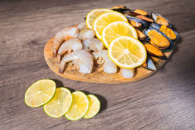 High angle view of sliced oranges on table