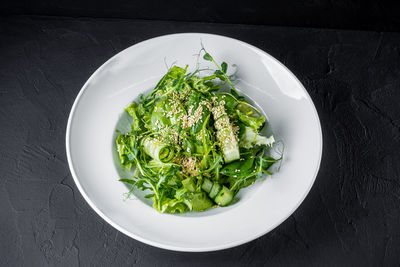 High angle view of salad in plate on table