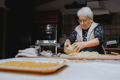 Man preparing food on table