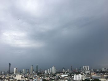 Modern buildings in city against sky