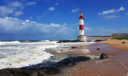 Lighthouse of itapua beach in salvador, bahia brazil