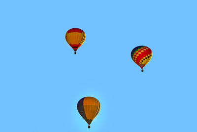 Colored hot air balloons in the blue sky