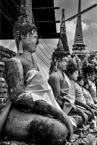 Statue of buddha outside building