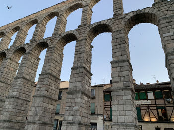 Low angle view of old ruin against sky