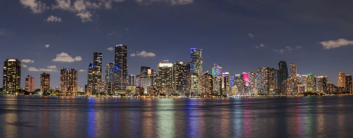 Illuminated buildings in city at night