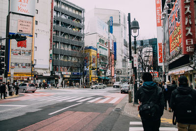 People walking on city street