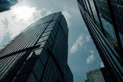 Low angle view of modern buildings against sky