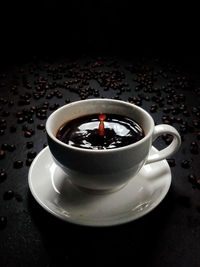 High angle view of coffee cup on table