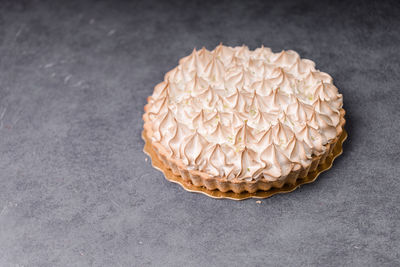 Close-up of pine cone on table