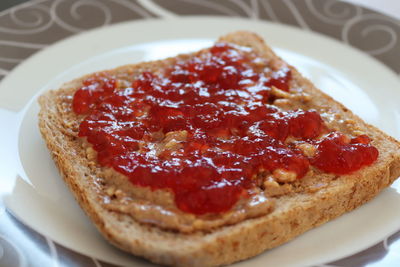 Close-up of peanut butter and jam on bread