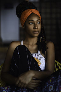 Interior portrait of young latin woman