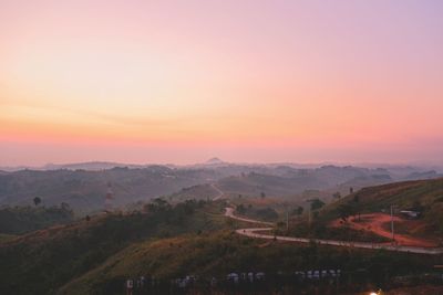 Scenic view of landscape against sky during sunset