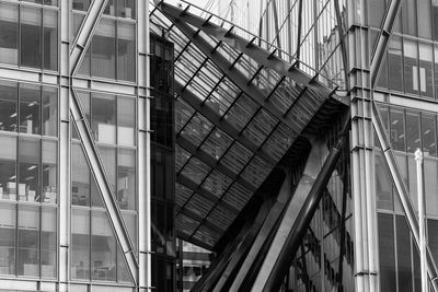 Low angle view of staircase in city against sky