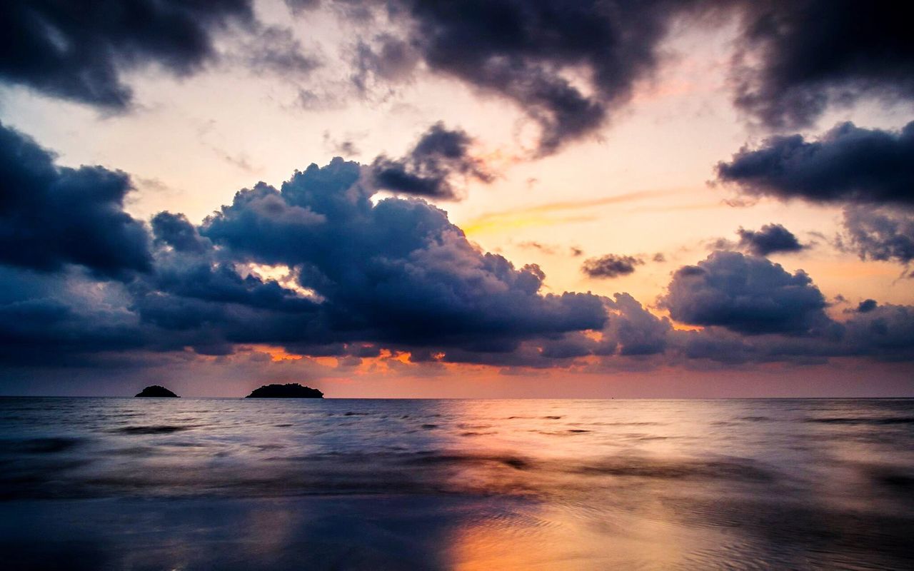 sea, scenics, sunset, sky, water, horizon over water, tranquil scene, beauty in nature, tranquility, cloud - sky, beach, cloudy, nature, idyllic, dramatic sky, cloud, orange color, shore, weather, atmospheric mood