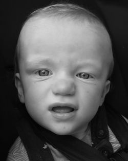 Close-up portrait of toddler at home