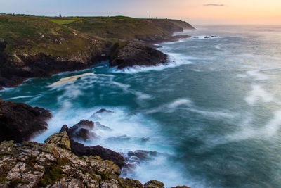 Scenic view of sea against sky during sunset