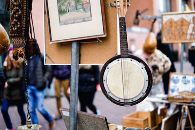 Close-up of hanging for sale in market