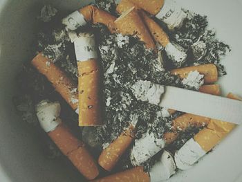 High angle view of cigarette on table