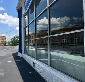 Reflection of sky on glass window