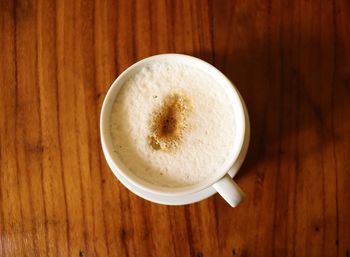 Directly above shot of coffee cup on table