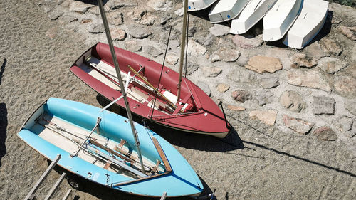 High angle view of boats moored on shore