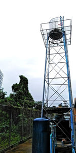 Low angle view of water tower against sky