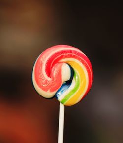 Close-up of orange slices over black background