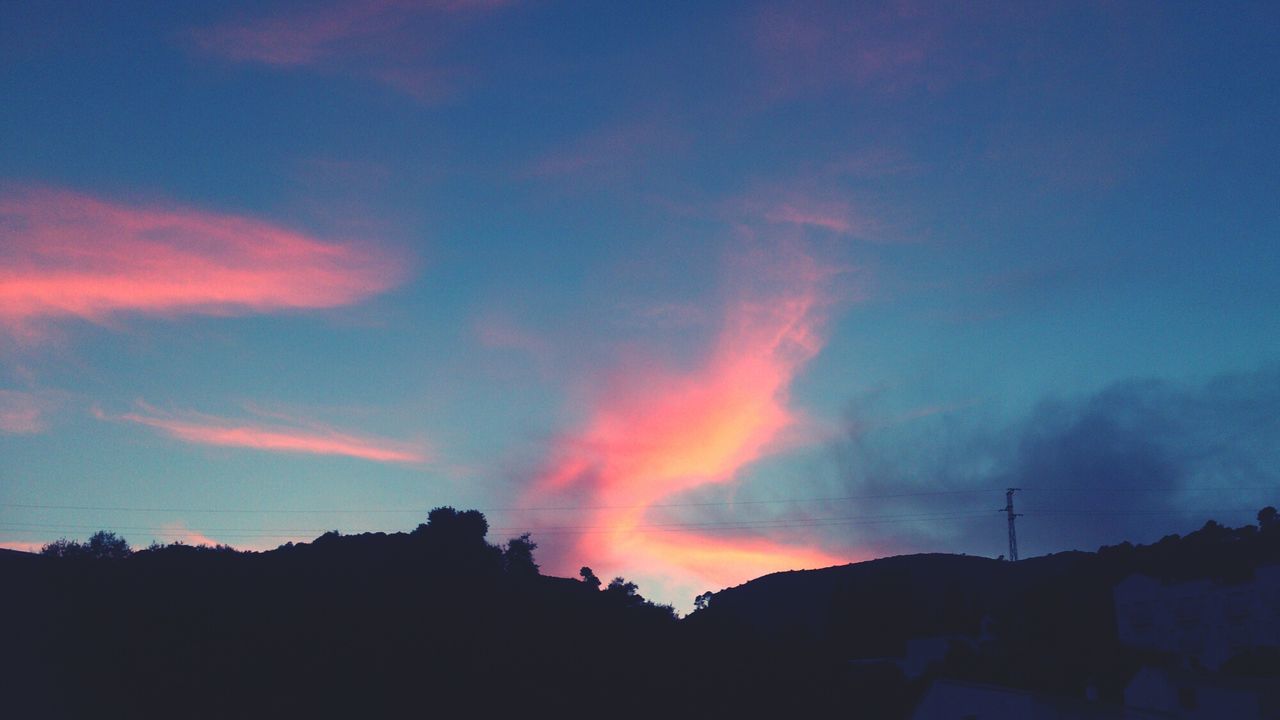 scenics, silhouette, sky, sunset, tranquil scene, beauty in nature, tranquility, mountain, landscape, cloud - sky, nature, idyllic, cloud, dramatic sky, blue, dusk, majestic, mountain range, orange color, non-urban scene