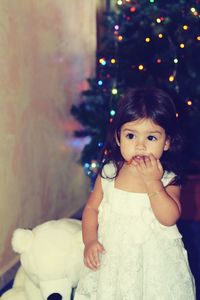 Portrait of a girl with christmas tree