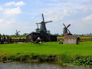 Traditional windmill against sky