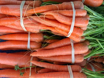 Close-up of carrots for sale at market stall