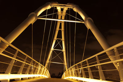 Low angle view of bridge at night