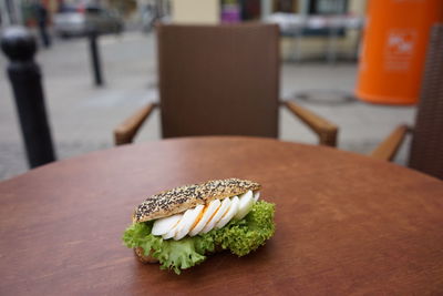 Close-up of sandwich on wooden table